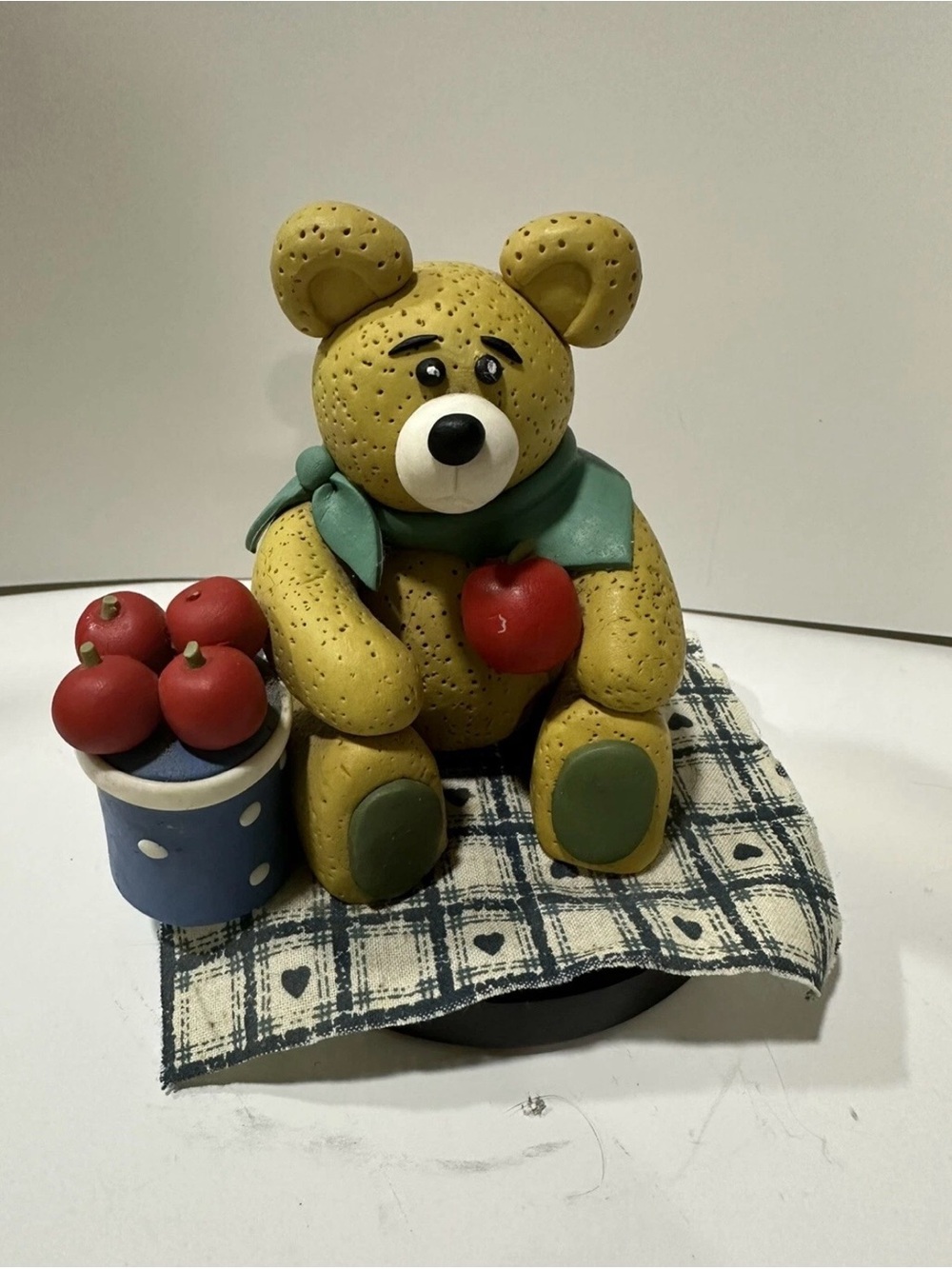 Clay Bear Figurine Bear With Apples On Base VTG with a heart blanket